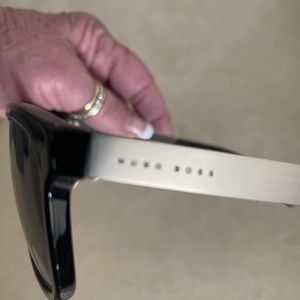 Hugo Boss sunglasses — black with silver on sides.  Perfect condition